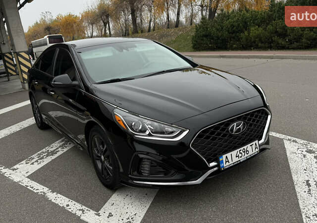 Черный Хендай Соната, объемом двигателя 2.36 л и пробегом 89 тыс. км за 13350 $, фото 1 на Automoto.ua