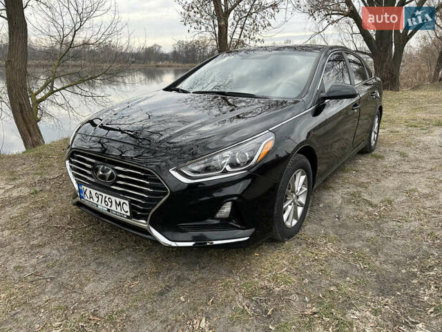 Черный Хендай Соната, объемом двигателя 2.4 л и пробегом 175 тыс. км за 11700 $, фото 1 на Automoto.ua