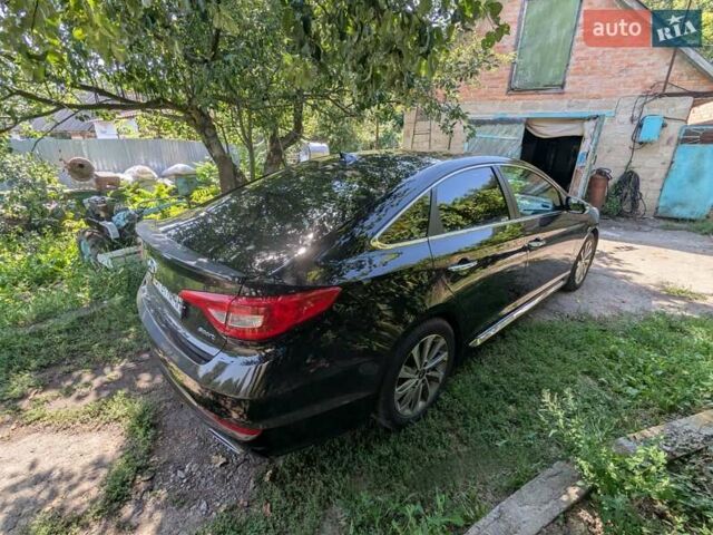 Чорний Хендай Соната, об'ємом двигуна 2.36 л та пробігом 162 тис. км за 13000 $, фото 1 на Automoto.ua