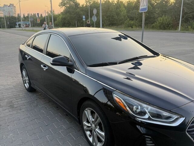Чорний Хендай Соната, об'ємом двигуна 2.36 л та пробігом 120 тис. км за 12800 $, фото 1 на Automoto.ua