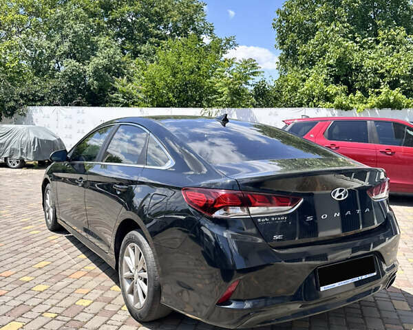 Чорний Хендай Соната, об'ємом двигуна 2.4 л та пробігом 154 тис. км за 11500 $, фото 1 на Automoto.ua