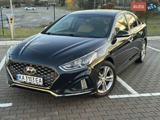 Черный Хендай Соната, объемом двигателя 2.4 л и пробегом 140 тыс. км за 13600 $, фото 1 на Automoto.ua