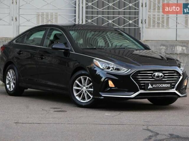Чорний Хендай Соната, об'ємом двигуна 2.36 л та пробігом 77 тис. км за 13900 $, фото 1 на Automoto.ua