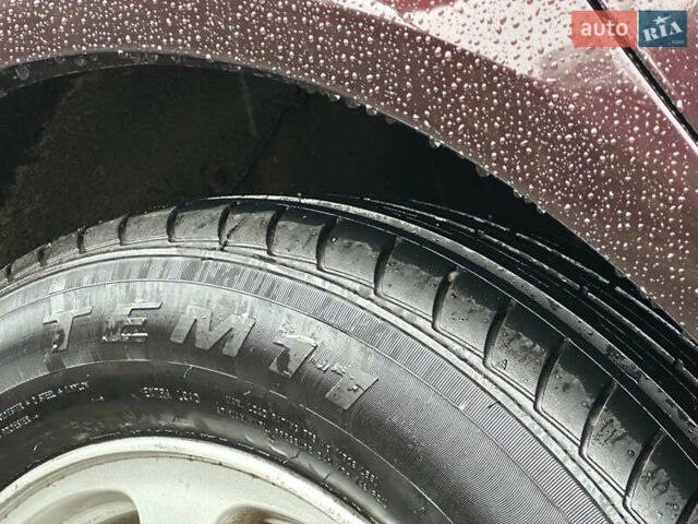 Коричневый Хендай Соната, объемом двигателя 2 л и пробегом 243 тыс. км за 5950 $, фото 1 на Automoto.ua