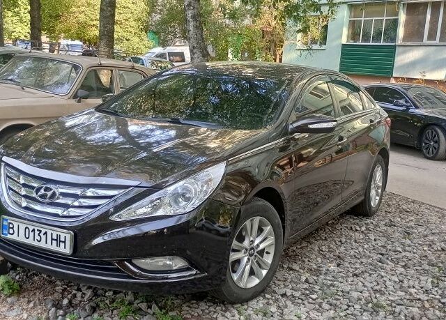 Коричневый Хендай Соната, объемом двигателя 2 л и пробегом 200 тыс. км за 9200 $, фото 1 на Automoto.ua