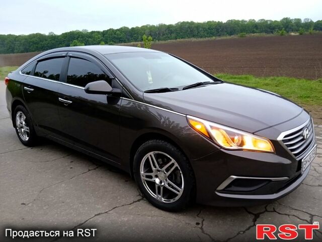 Коричневый Хендай Соната, объемом двигателя 2.4 л и пробегом 240 тыс. км за 11500 $, фото 1 на Automoto.ua