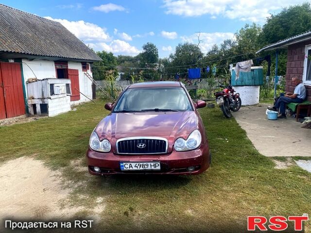 Червоний Хендай Соната, об'ємом двигуна 2 л та пробігом 336 тис. км за 2150 $, фото 1 на Automoto.ua