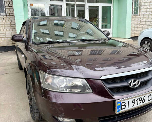 Красный Хендай Соната, объемом двигателя 2.4 л и пробегом 253 тыс. км за 5500 $, фото 1 на Automoto.ua