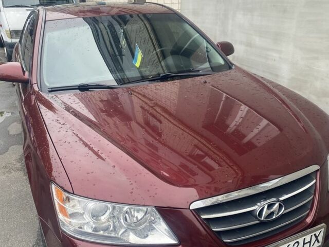 Красный Хендай Соната, объемом двигателя 2.4 л и пробегом 185 тыс. км за 7700 $, фото 1 на Automoto.ua