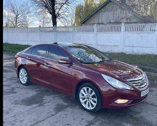 Красный Хендай Соната, объемом двигателя 2.4 л и пробегом 133 тыс. км за 10500 $, фото 1 на Automoto.ua