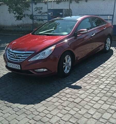 Красный Хендай Соната, объемом двигателя 2.36 л и пробегом 185 тыс. км за 8699 $, фото 1 на Automoto.ua