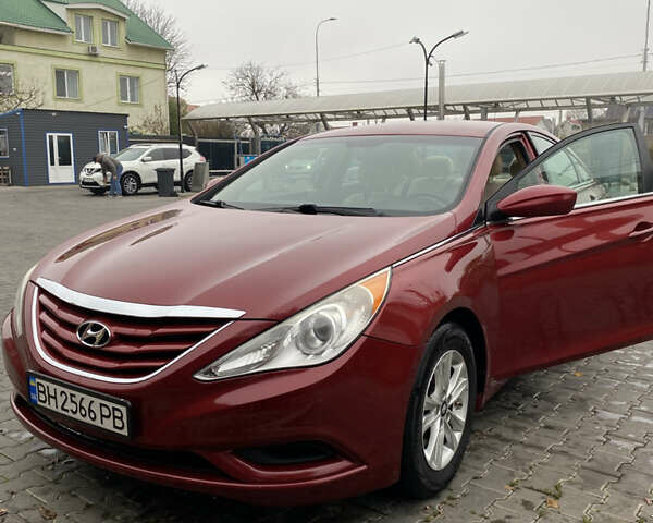 Красный Хендай Соната, объемом двигателя 2.36 л и пробегом 191 тыс. км за 7800 $, фото 1 на Automoto.ua
