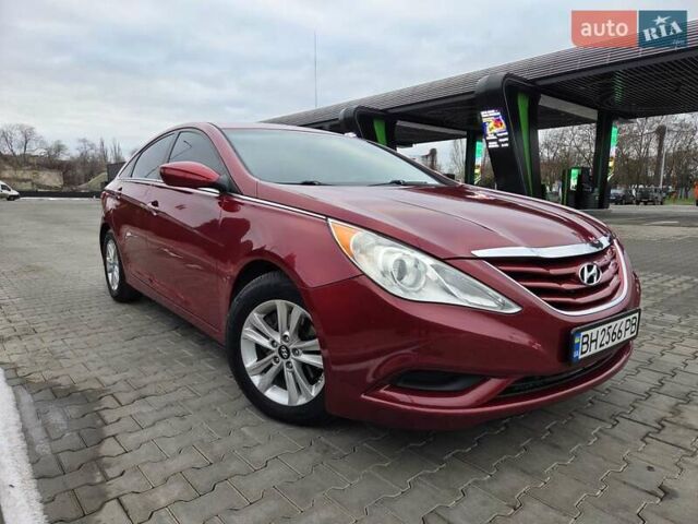 Червоний Хендай Соната, об'ємом двигуна 2.4 л та пробігом 191 тис. км за 7800 $, фото 1 на Automoto.ua