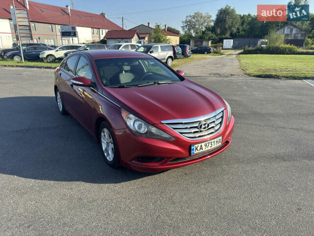 Червоний Хендай Соната, об'ємом двигуна 2.36 л та пробігом 111 тис. км за 9000 $, фото 1 на Automoto.ua