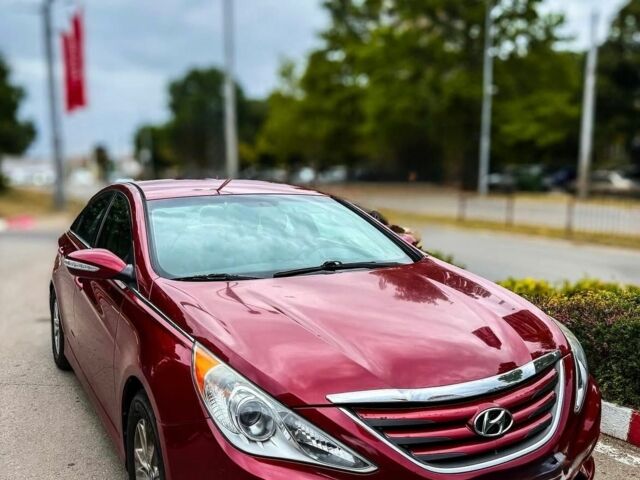 Красный Хендай Соната, объемом двигателя 2.4 л и пробегом 104 тыс. км за 9000 $, фото 1 на Automoto.ua