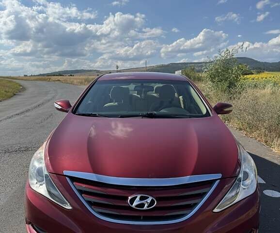 Красный Хендай Соната, объемом двигателя 2.4 л и пробегом 104 тыс. км за 9600 $, фото 1 на Automoto.ua