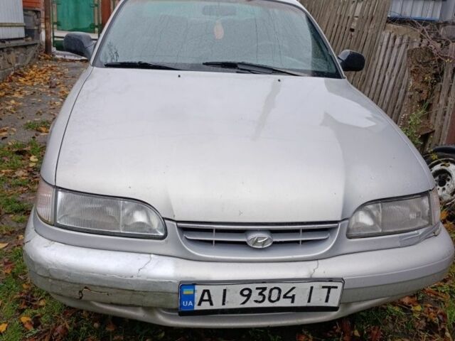 Серый Хендай Соната, объемом двигателя 2 л и пробегом 673 тыс. км за 1300 $, фото 1 на Automoto.ua