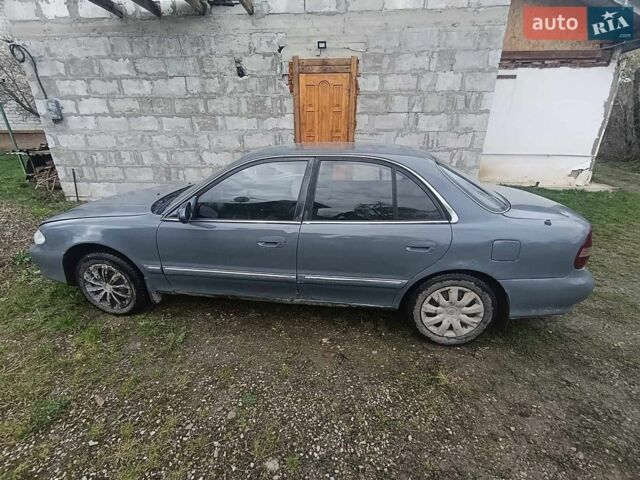 Серый Хендай Соната, объемом двигателя 2 л и пробегом 980 тыс. км за 900 $, фото 1 на Automoto.ua
