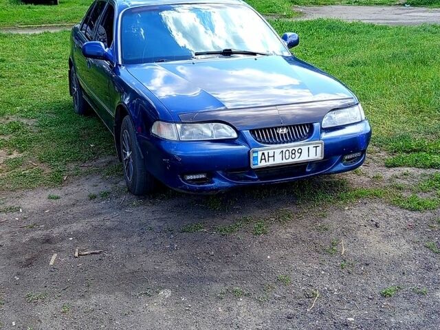 Синий Хендай Соната, объемом двигателя 2 л и пробегом 485 тыс. км за 1350 $, фото 1 на Automoto.ua