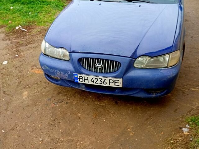 Синий Хендай Соната, объемом двигателя 2 л и пробегом 100 тыс. км за 1500 $, фото 1 на Automoto.ua