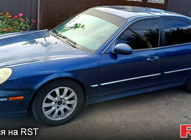 Синий Хендай Соната, объемом двигателя 2.7 л и пробегом 242 тыс. км за 3380 $, фото 1 на Automoto.ua