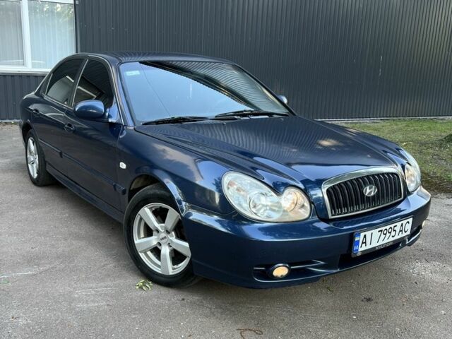 Синий Хендай Соната, объемом двигателя 2 л и пробегом 344 тыс. км за 3000 $, фото 1 на Automoto.ua