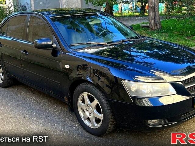 Синий Хендай Соната, объемом двигателя 2.4 л и пробегом 240 тыс. км за 3500 $, фото 1 на Automoto.ua