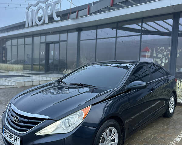 Синий Хендай Соната, объемом двигателя 2.36 л и пробегом 238 тыс. км за 7200 $, фото 1 на Automoto.ua