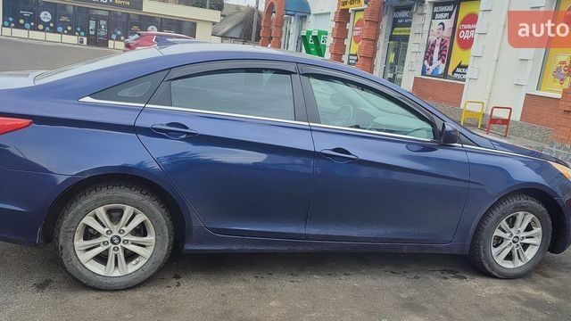 Синий Хендай Соната, объемом двигателя 2.4 л и пробегом 282 тыс. км за 7500 $, фото 1 на Automoto.ua