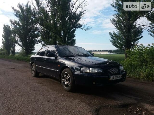 Синій Хендай Соната, об'ємом двигуна 2 л та пробігом 300 тис. км за 3750 $, фото 1 на Automoto.ua