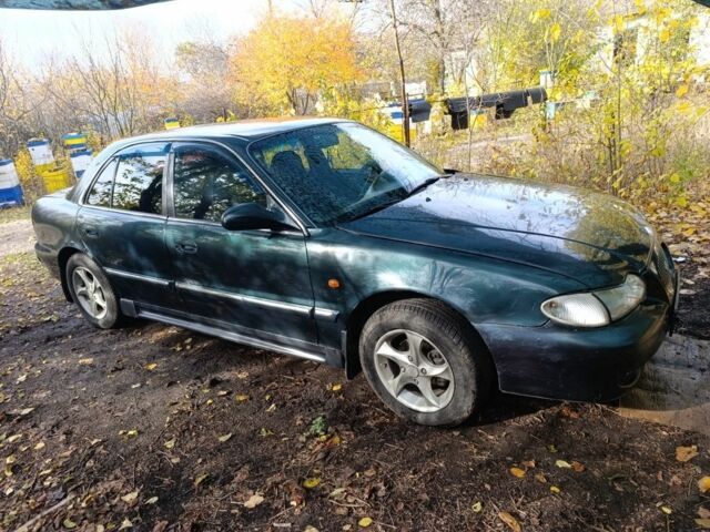 Зеленый Хендай Соната, объемом двигателя 2 л и пробегом 311 тыс. км за 1903 $, фото 1 на Automoto.ua