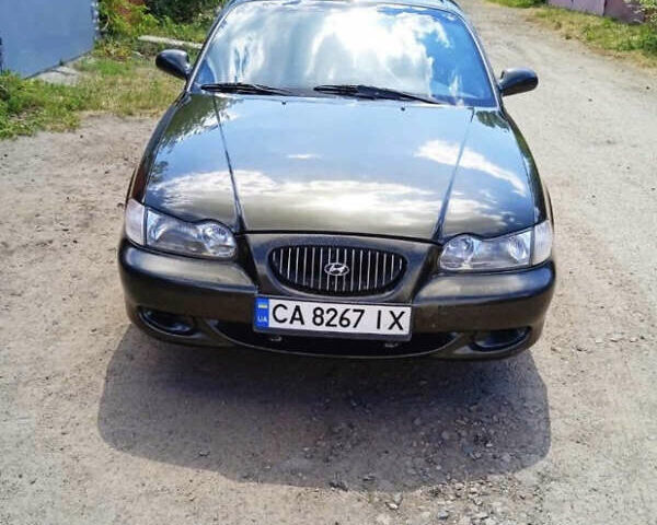 Зеленый Хендай Соната, объемом двигателя 2 л и пробегом 225 тыс. км за 2600 $, фото 1 на Automoto.ua