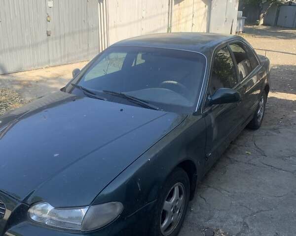 Зеленый Хендай Соната, объемом двигателя 2 л и пробегом 205 тыс. км за 1200 $, фото 1 на Automoto.ua