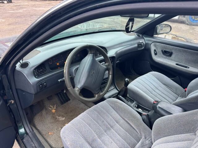 Зеленый Хендай Соната, объемом двигателя 1.8 л и пробегом 300 тыс. км за 750 $, фото 1 на Automoto.ua