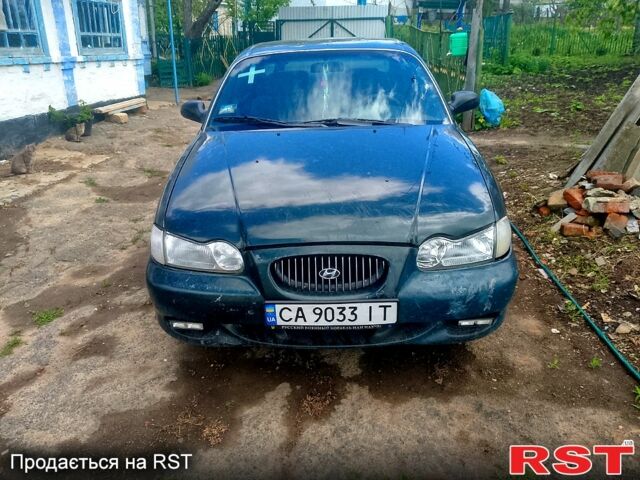 Зелений Хендай Соната, об'ємом двигуна 2 л та пробігом 268 тис. км за 2160 $, фото 1 на Automoto.ua