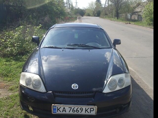 Черный Хендай Тибурон, объемом двигателя 2 л и пробегом 194 тыс. км за 1500 $, фото 1 на Automoto.ua