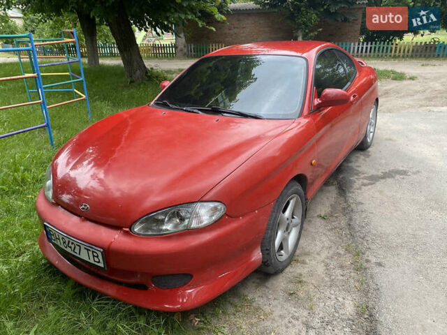 Красный Хендай Тибурон, объемом двигателя 1.98 л и пробегом 98 тыс. км за 4150 $, фото 1 на Automoto.ua