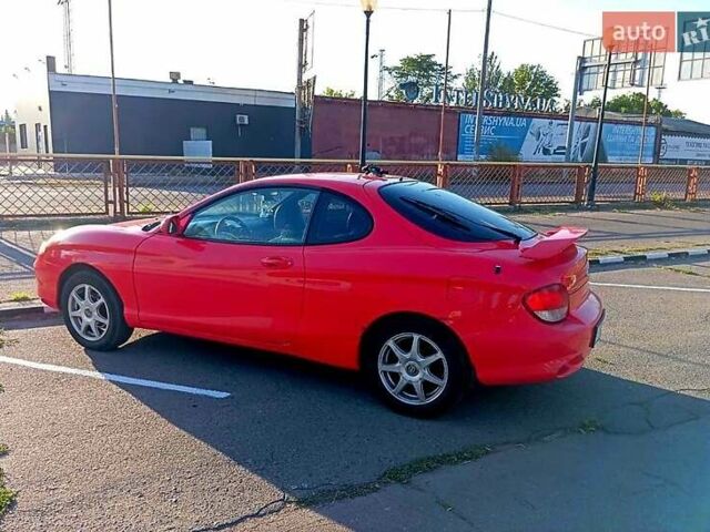 Красный Хендай Тибурон, объемом двигателя 2 л и пробегом 186 тыс. км за 4000 $, фото 1 на Automoto.ua