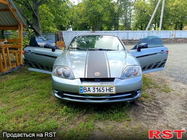 Серый Хендай Тибурон, объемом двигателя 2 л и пробегом 200 тыс. км за 3500 $, фото 1 на Automoto.ua