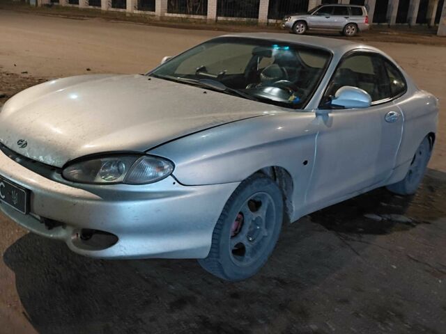 Серый Хендай Тибурон, объемом двигателя 2 л и пробегом 250 тыс. км за 2500 $, фото 1 на Automoto.ua