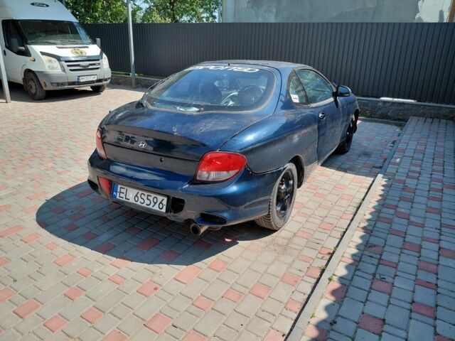 Синий Хендай Тибурон, объемом двигателя 1.6 л и пробегом 232 тыс. км за 650 $, фото 1 на Automoto.ua