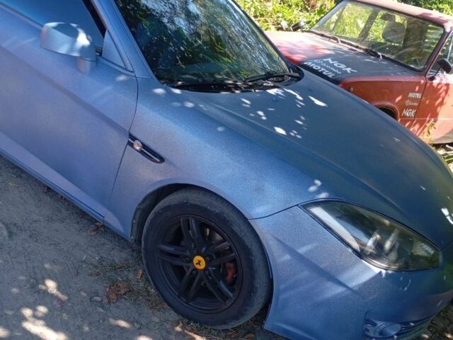 Синій Хендай Тібурон, об'ємом двигуна 2 л та пробігом 400 тис. км за 6997 $, фото 1 на Automoto.ua