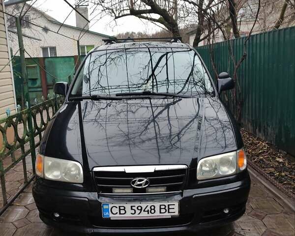 Черный Хендай Траджет, объемом двигателя 2 л и пробегом 297 тыс. км за 4500 $, фото 1 на Automoto.ua