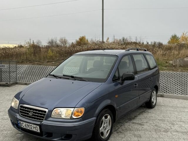 Синий Хендай Траджет, объемом двигателя 2 л и пробегом 300 тыс. км за 2100 $, фото 1 на Automoto.ua