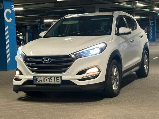 Белый Хендай Туксон, объемом двигателя 2 л и пробегом 87 тыс. км за 11500 $, фото 1 на Automoto.ua