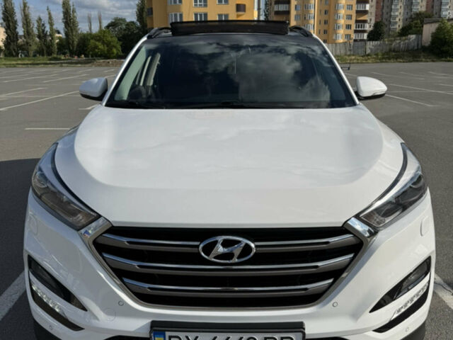 Белый Хендай Туксон, объемом двигателя 2 л и пробегом 77 тыс. км за 24000 $, фото 1 на Automoto.ua