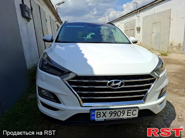 Білий Хендай Туксон, об'ємом двигуна 2 л та пробігом 100 тис. км за 24500 $, фото 1 на Automoto.ua