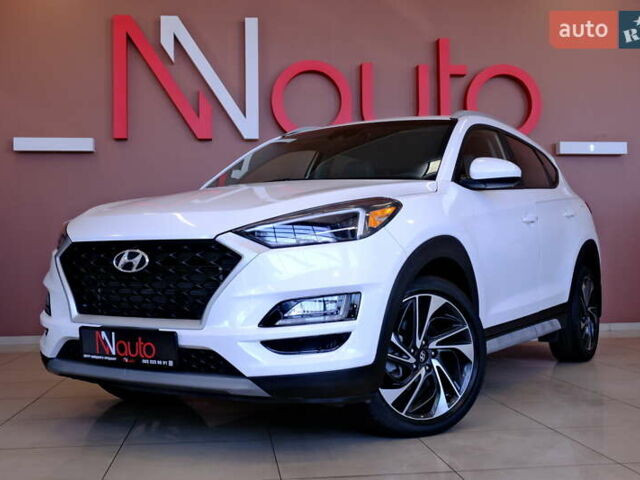 Белый Хендай Туксон, объемом двигателя 2.4 л и пробегом 63 тыс. км за 19500 $, фото 1 на Automoto.ua