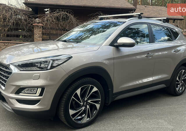 Бежевый Хендай Туксон, объемом двигателя 2 л и пробегом 98 тыс. км за 26700 $, фото 1 на Automoto.ua