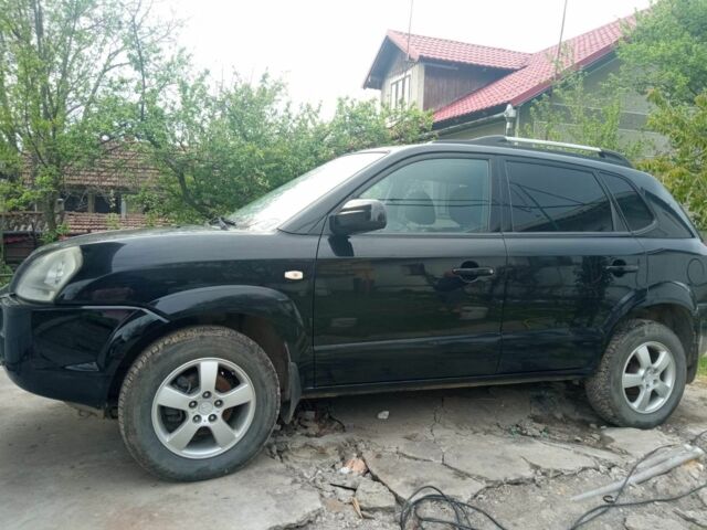 Черный Хендай Туксон, объемом двигателя 2 л и пробегом 217 тыс. км за 7200 $, фото 1 на Automoto.ua